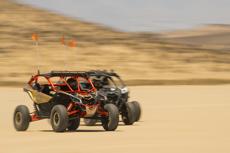 x_maverick-x3-xrs-turbo-r-gold-and-can-am-red-desert-group-riding-1